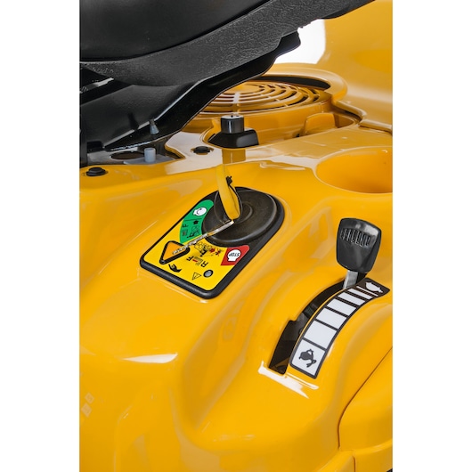CubCadet 13AB21JD603 lawn mower control levers and decals, close-up, yellow body.