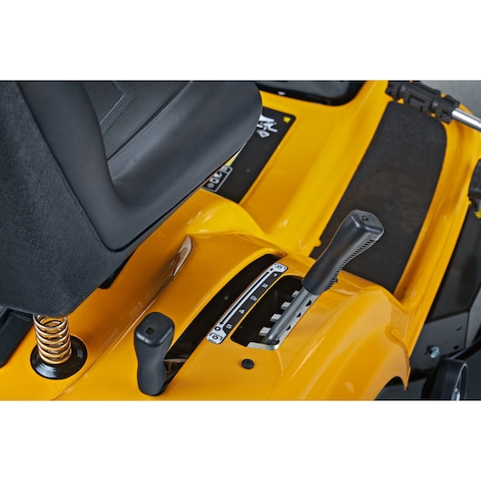 CubCadet LT2-NR92 13AB71BE603 riding mower control levers and seat close-up, angled view.