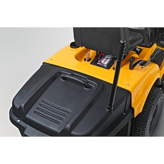 CubCadet LT2-NR92 13AB71BE603 photography of rear seat and battery section, angled view, yellow body.