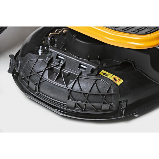 CubCadet LT2-NS92 13AB78BY603 lawn tractor mower deck close-up, showing black cover and yellow warning label.