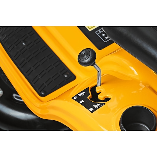CubCadet LT2-NS92 13AB78BY603 forward/reverse gear lever close-up, yellow body and black pedal.