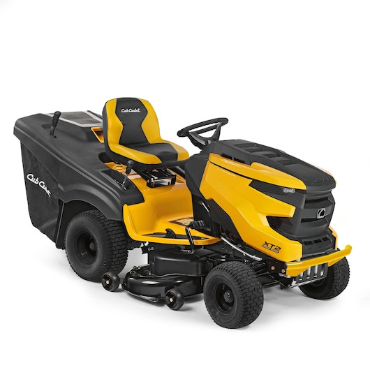 CubCadet 13AFA1TR603 riding lawn mower, yellow and black, side angle, with rear grass collection bag.