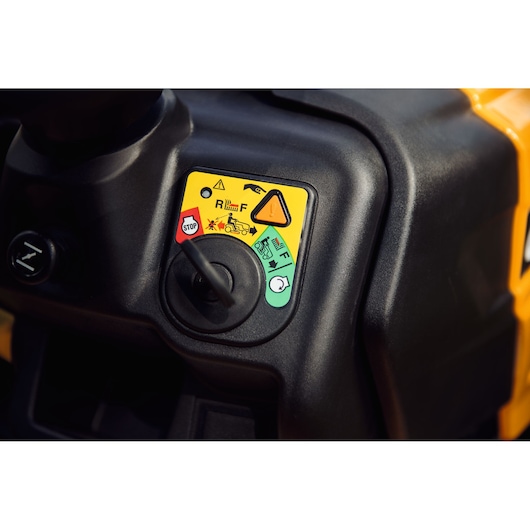 CubCadet 13AJ71BN603 LT3-PR105 lawn tractor control panel, close-up, showing operation symbols and ignition.