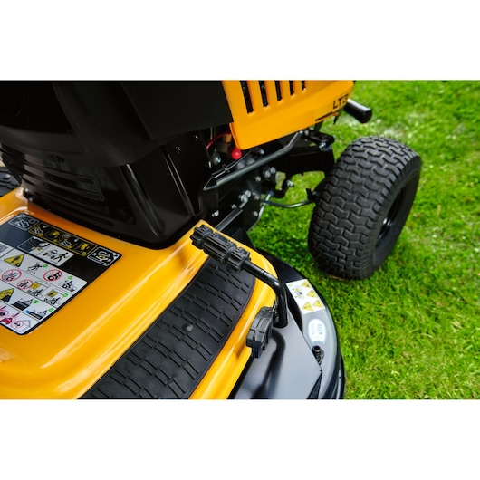 CubCadet LT3-PR105 13AJ71BN603 lawn tractor close-up showing control lever and safety labels.