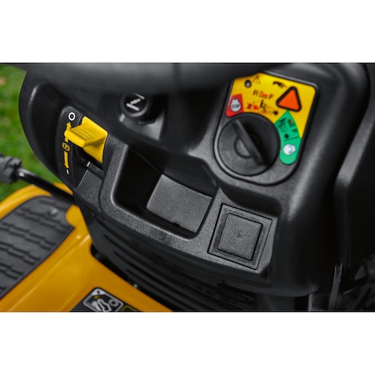 CubCadet LT3-PR105 13AJ71BN603 lawn tractor control panel, close-up angle, showing yellow lever and ignition switch.