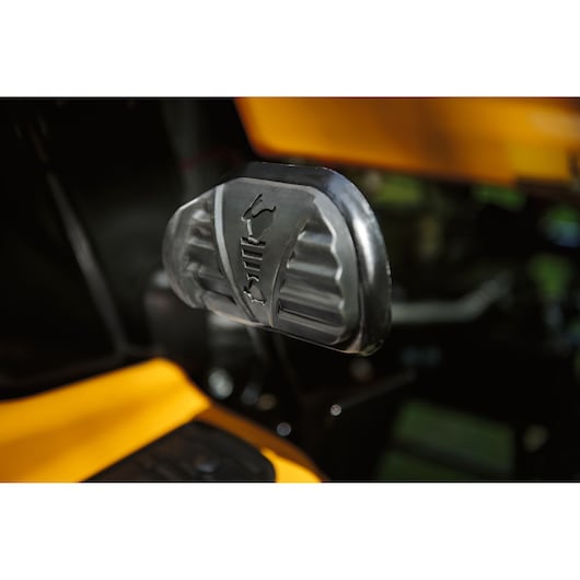 CubCadet LT3-PR105 lawn tractor pedal close-up, black pedal with CubCadet logo, yellow body visible.