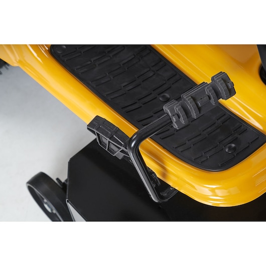 CubCadet 13AJ71BN603 LT3-PR105 lawn tractor foot pedal and side panel, close-up, black and yellow.