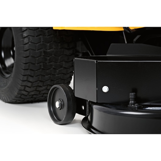 CubCadet 13AJ71BN603 LT3-PR105 lawn tractor close-up side view showing wheel and mower deck.
