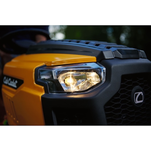 Photo of CubCadet LT3-PR105 lawn tractor headlight and grille, SKU 13AJ71BN603, close-up front angle.