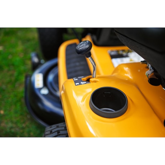 CubCadet LT3-PR105 13AJ71BN603 lawn tractor gear lever and cup holder close-up, side angle.