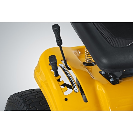 CubCadet LT3-PS107 SKU 13AY78BS603 mower controls close-up, yellow body, seat corner, side angle.