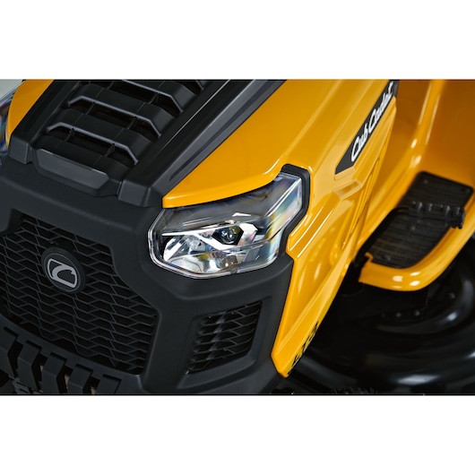 CubCadet LT3-PS107 lawn tractor front detail, yellow and black hood with headlight, SKU 13AY78BS603, close-up angle.