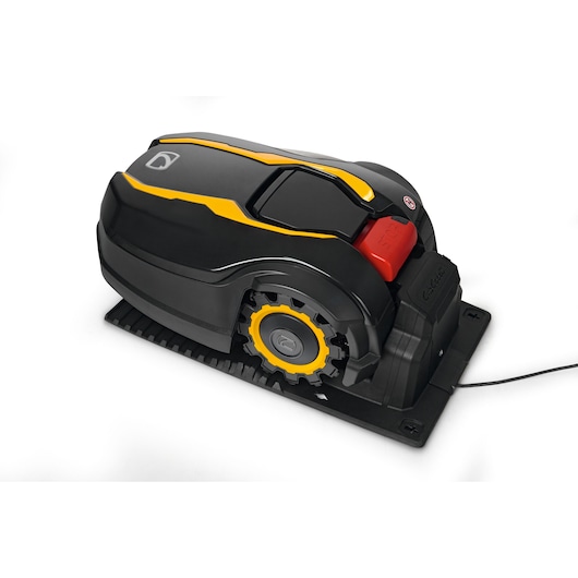 CubCadet 22AKFEFA603 robotic lawn mower in black and yellow, angled view on charging base.