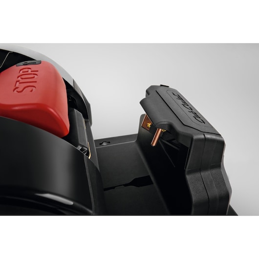 CubCadet 22AKHEFA603 mower charging station close-up with red STOP button and branded cover.
