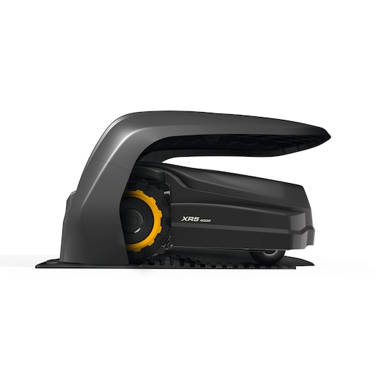 CubCadet SKU 22AKLEFA603 robotic lawn mower side view, black and yellow, with charging station.