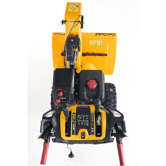 CubCadet 31AY5EVX603 snow blower top view, yellow body, control handles, and black wheels on white background.