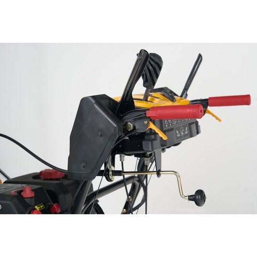 CubCadet 31AY5EVX603 snow blower control panel close-up with red and black handles, photography, side angle.