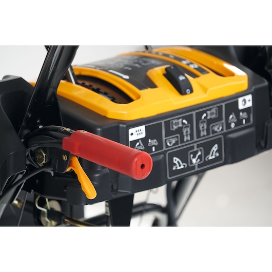 CubCadet 31AY5EVX603 snow blower control panel close-up with red handle and yellow lever.
