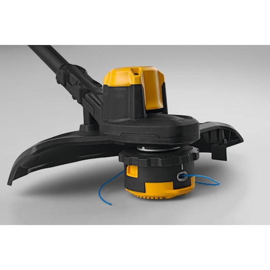 CubCadet 41AT6TGT603 string trimmer head close-up on white background, black and yellow design.