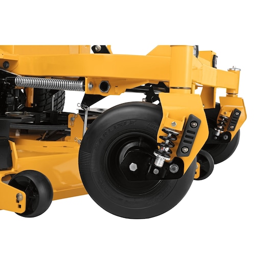 CubCadet 47AICAB6603 close-up of yellow mower front caster wheels with suspension, side angle on white.