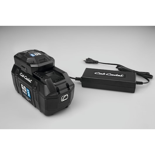 CubCadet 49AL601-603 60 volt max lithium-ion battery and charger, angled on white background.