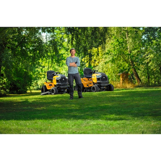 CubCadet LT3-PR105LT3-PS107 SKU 13AJ71BN603 lawn tractors outdoors with person standing in front.